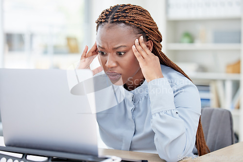 Image of Black woman, laptop and stress headache in office with mistake, fail or error at accounting agency. Employee, accountant and frustrated face with thinking, 404 glitch or ideas with anger for pc crash