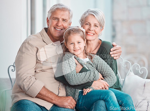 Image of Grandparents, hug and portrait on couch with girl, care and bonding with love, retirement and home living room. Happy old man, elderly woman and embrace child in lounge, relax and pride in apartment