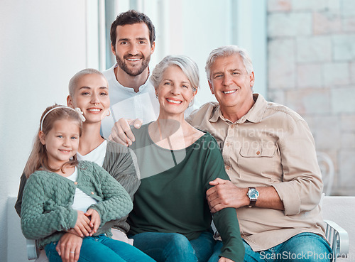 Image of Grandparents, parents and girl on sofa, portrait and hug with care, bonding and love in family home lounge. Mom, dad and child with embrace for smile, relax and together on living room couch in house