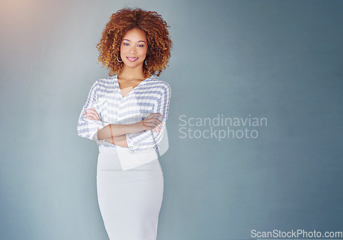 Image of Portrait, smile and business woman with arms crossed isolated on a gray background mockup space. Confidence, professional pride and creative designer, entrepreneur or employee at startup in Brazil