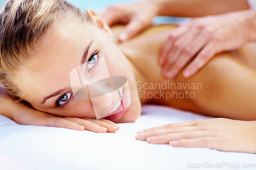 Image of Woman, portrait and smile at spa for back massage wellness cosmetics or holistic therapy at holiday resort. Beauty salon, skincare and face of client relax for shoulder treatment, healing or vacation