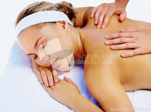 Image of Spa, massage and woman with beauty therapist hands for back wellness and health in a salon. Resort, masseuse table and calm female person with zen and pamper treatment for body and stress relief