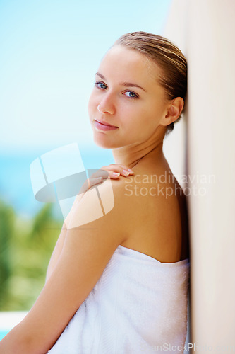 Image of Woman, spa and outdoor with skincare, health or hands with face for results with blue sky background. Girl, touch skin and facial change in portrait, beauty and transformation for wellness in nature
