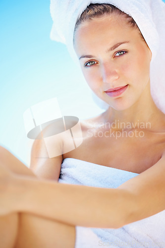 Image of Portrait, spa and young woman with towel for self care, cosmetic or body treatment. Beauty, clean and female person from Canada with grooming, health or wellness skin routine at natural salon.