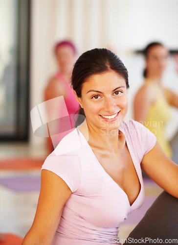 Image of Portrait, stretching and woman in yoga for fitness, body exercise class and happy mindfulness. Club, pilates and group of people in holistic health retreat for wellness, balance and smile on face.