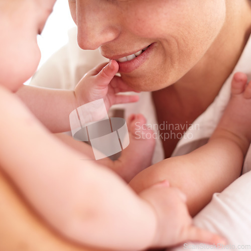 Image of Play, family and mother with baby, closeup and happiness with joy, home and wellness. Mama, infant and toddler with fun, relax and healthy with love, bonding together and childhood development