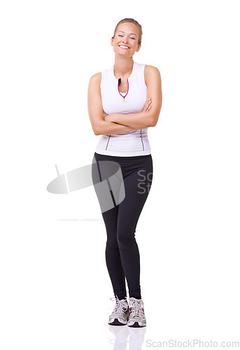 Image of Portrait, woman and arms crossed for exercise, studio and happy with training wellness in gym clothes. Model, usa and smile face with commitment to health body, fitness and relax by white background