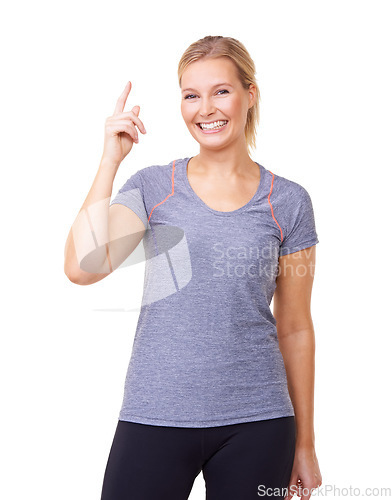 Image of Portrait, woman or pointing for fitness, studio or gym announcement with exercise wellness. Person, smile face and emoji with giveaway on training gear, health body and promotion by white background