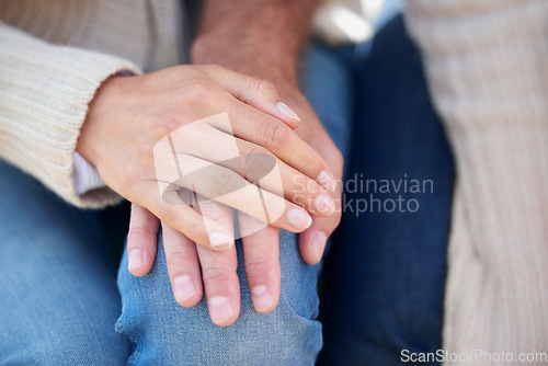 Image of Closeup, holding hands and couple with love, support and trust in partnership or marriage together. Care, man and woman bonding with solidarity, empathy and sign of kindness, compassion or connection