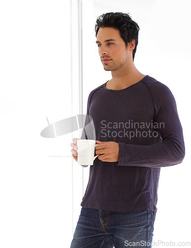 Image of Man, coffee and face with thinking or serious in the morning for relax, peace and satisfaction at home. Person, calm or thoughtful with espresso, beverage or hot chocolate for rest, wellness or ideas