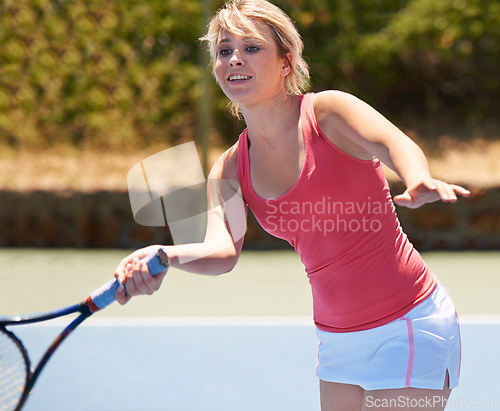 Image of Tennis, sport and woman with racket on court for competition, match or training outdoor with playing. Player, person or game with exercise, workout or competitive with wellness and fitness in summer