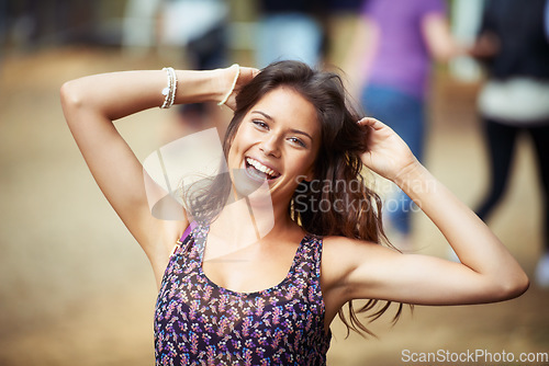 Image of Woman, outdoors and smile in portrait, music festival and fun on vacation or traveling. Female person, face and holiday in Ibiza, casual and cool fashion for party, concert and happy for freedom