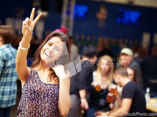 Image of Woman, outdoors and smile in portrait, peace sign and fun on vacation or traveling. Happy female person, face and holiday in Ibiza, casual and cool fashion for party, concert and emoji for freedom