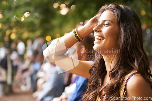 Image of Forest, outdoor music festival and happy woman, nature crowd or group happiness at woods social event. Gen z concert, audience member and girl listening to entertainment, song or live performance