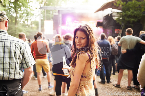 Image of Woman, portrait and outdoor music festival with crowd for party, event or DJ in nature. Face of happy female person smile and enjoying sound or audio at carnival, concert or performance outside