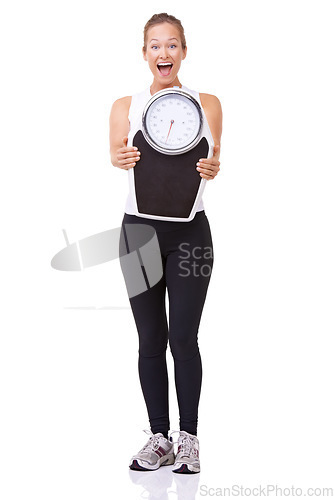 Image of Fitness, scale and portrait of excited woman with smile, workout and wellness with happiness in studio. Health, exercise and body of girl with weight loss measurement isolated on white background.