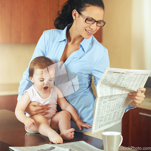 Image of Woman, mom and baby with tantrum in home while reading, newspaper and multitasking for remote job. Single mother, toddler or little girl with upset face by growth, milestone or development in kitchen