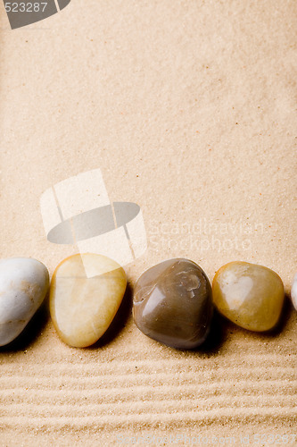 Image of Rock on Sand Beach