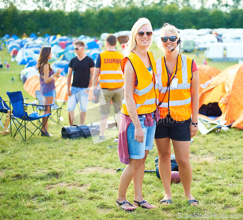 Image of Portrait, sunglasses and event staff at festival for music, party and carnival outdoor in summer. Happy women, girls camping and security team in headset, safety vest or celebration concert in nature