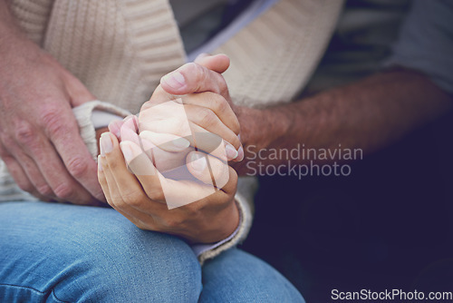 Image of Couple, holding hands and closeup with love and support with empathy for illness, diagnosis and cancer. Solidarity, man and woman with gratitude, hope or respect for partner with crisis in health