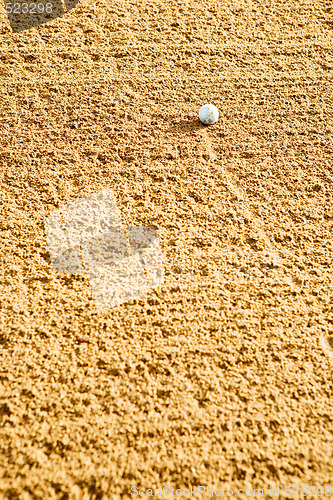 Image of Golf Ball in Bunker