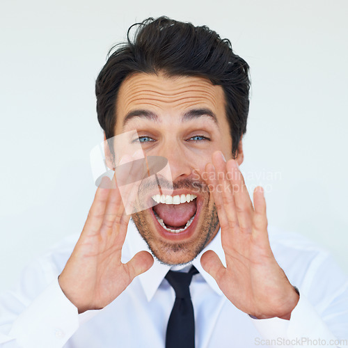 Image of Portrait, hands and shout, businessman with news, opinion or protest announcement in studio. Face of excited man screaming for attention, notification or voice with sound, noise and white background.