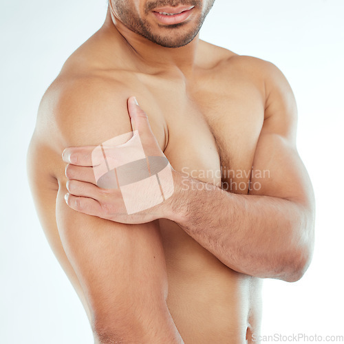 Image of Shoulder pain, hands and fitness man in studio with muscle problem, arthritis or fibromyalgia on white background. Arm, injury and athletic male model with osteoporosis, stress or sports mistake