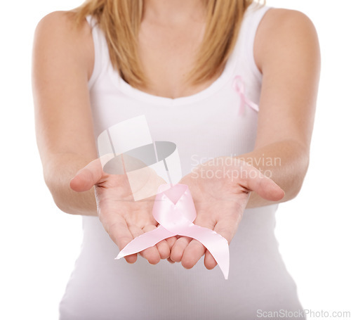 Image of Woman, hands and pink ribbon for breast cancer, support or awareness against a white studio background. Closeup of female person or blonde with symbol, bow or band for voice, start or launch campaign