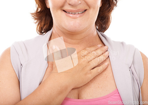 Image of Woman, care and hand on chest in support with empathy, kindness and wellness in white background. Studio, closeup and person gesture to heart, healthcare and smile for blood pressure and pulse