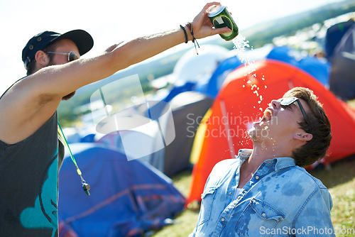 Image of Beer, festival or drunk friends drinking together, alcohol beverage or outdoor social event. Summer music concert, pouring drinks or excited people with freedom, can or party games in celebration