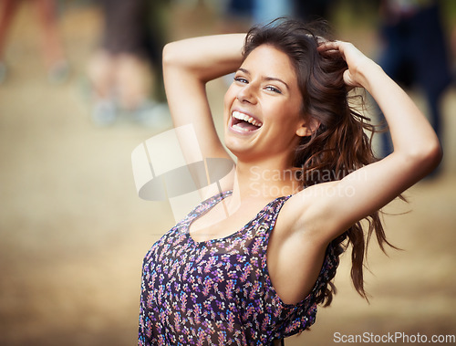 Image of Woman, outdoors and laughing in portrait, music festival and fun on vacation or traveling. Female person, face and holiday in Ibiza, casual and cool fashion for party, concert and happy for freedom