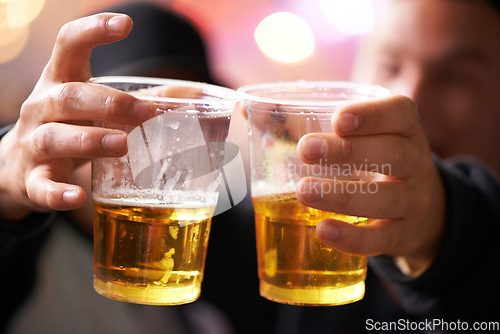 Image of Hands of friends at music festival with cheers, beer and excited at concert event together. Drink, celebration and men at carnival party with freedom, adventure and people with plastic cup toast.