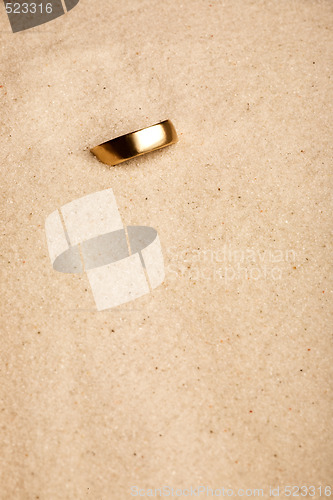 Image of Wedding Ring in Sand