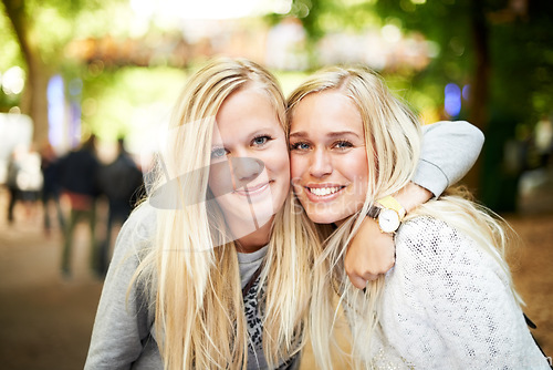 Image of Hug, outdoor festival portrait and happy friends, women or people smile for fun bonding, reunion or social gathering. Music concert, face and girl embrace for holiday freedom, entertainment or event