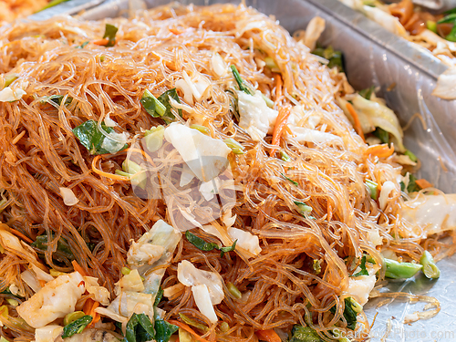 Image of Fried glass noodles, woon sen, at a market in Thailand