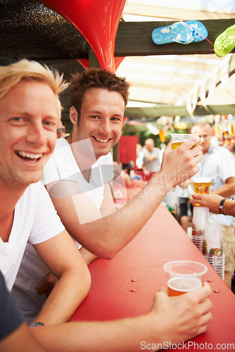 Image of Happy man, friends and drinking at music festival, bar or event for summer party or DJ concert. Portrait of male person smile with alcohol or beer for friendship at carnival or outdoor cafe stand