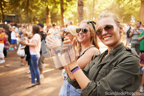 Image of Woman, friends and outdoor crowd at music festival for summer holiday, celebration or party concert. Female person, clapping and community dancing in nature excited group, event or social gathering