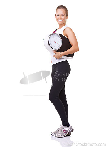 Image of Fitness, scale and portrait of woman with smile, workout and wellness with healthy pride in studio. Health, exercise and body of happy girl with weight loss measurement isolated on white background.