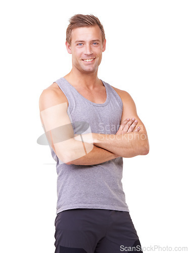 Image of Portrait, man and arms crossed for exercise, studio and happy with training wellness in gym clothes. Person, pride and smile face with commitment to health body, fitness and relax by white background