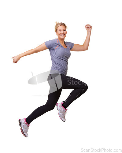 Image of Woman, running and jump for fitness success, workout and training celebration, energy or achievement in studio. Portrait of sports model or runner in air for exercise and cardio on a white background