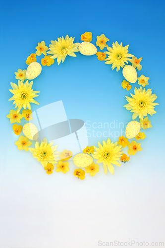 Image of Easter Wreath with Decorative Eggs and Spring Flowers