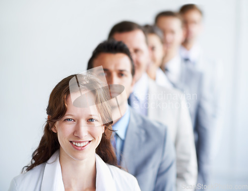 Image of Woman, portrait and leader for team finance career, standing and ready for job interview. Worker, corporate accountant in suit or professional in workplace, colleagues in office and confident