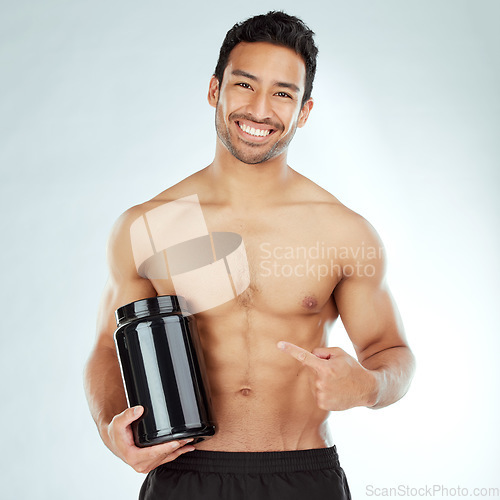 Image of Face, body and fitness man hand pointing to protein in studio for workout recovery suggestion on white background. Product, whey or nutritionist show Weight loss, muscle growth or supplement support