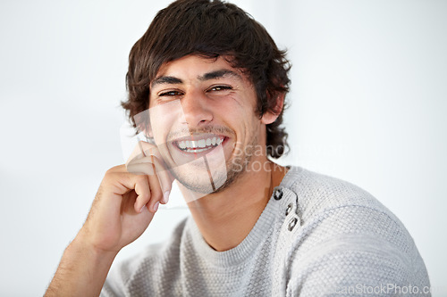 Image of Smile, portrait and young man in the office with positive, good and confident attitude. Happy, creative career and face of professional male designer from Mexico with pride in modern workplace.