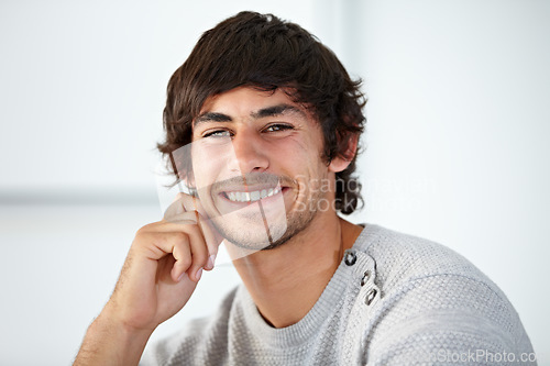 Image of Happy, portrait and young man in the office with positive, good and confident attitude. Smile, creative career and face of professional male designer from Mexico with pride in modern workplace.