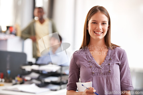 Image of Portrait, fashion and woman with a book, designer and smile in a workplace, entrepreneur and consultant. Face, person or worker with notepad, pen or business with idea, happy or cheerful in an office