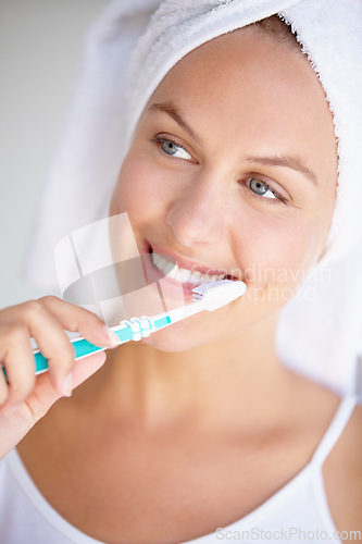Image of Woman, toothbrush and smile for clean hygiene in bathroom for healthy mouth, gum dental care or wellness. Female person, brushing teeth and whitening routine for orthodontics, oral glow or gingivitis