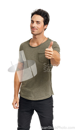 Image of Smile, thumbs up and portrait of man in a studio for agreement, good or positive expression. Happy, fashion and handsome young male model with approval hand gesture isolated by white background.