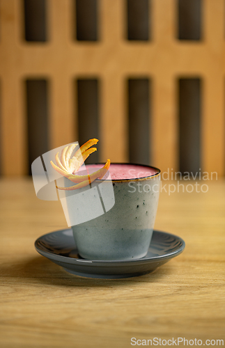 Image of Strawberry latte with orange peel