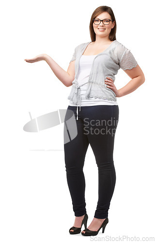 Image of Portrait, presentation and palm with a plus size woman in studio isolated on a white background for offer. Advertising, marketing or information with a happy young person showing space recommendation
